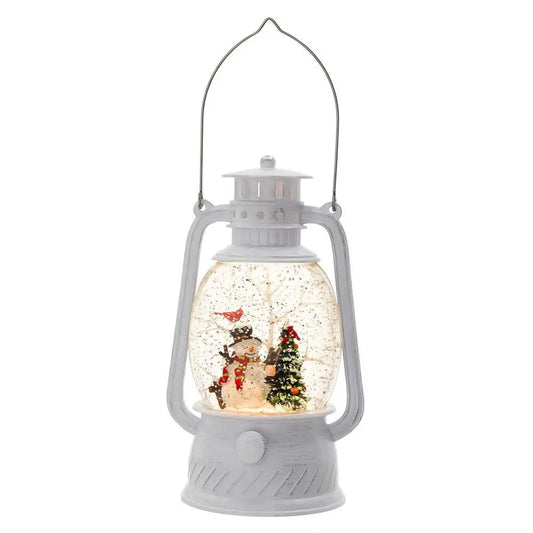 White plastic Christmas lantern with snowman and tree; LED water-spinning 6-hour timer on Tampa Home & Garden Store