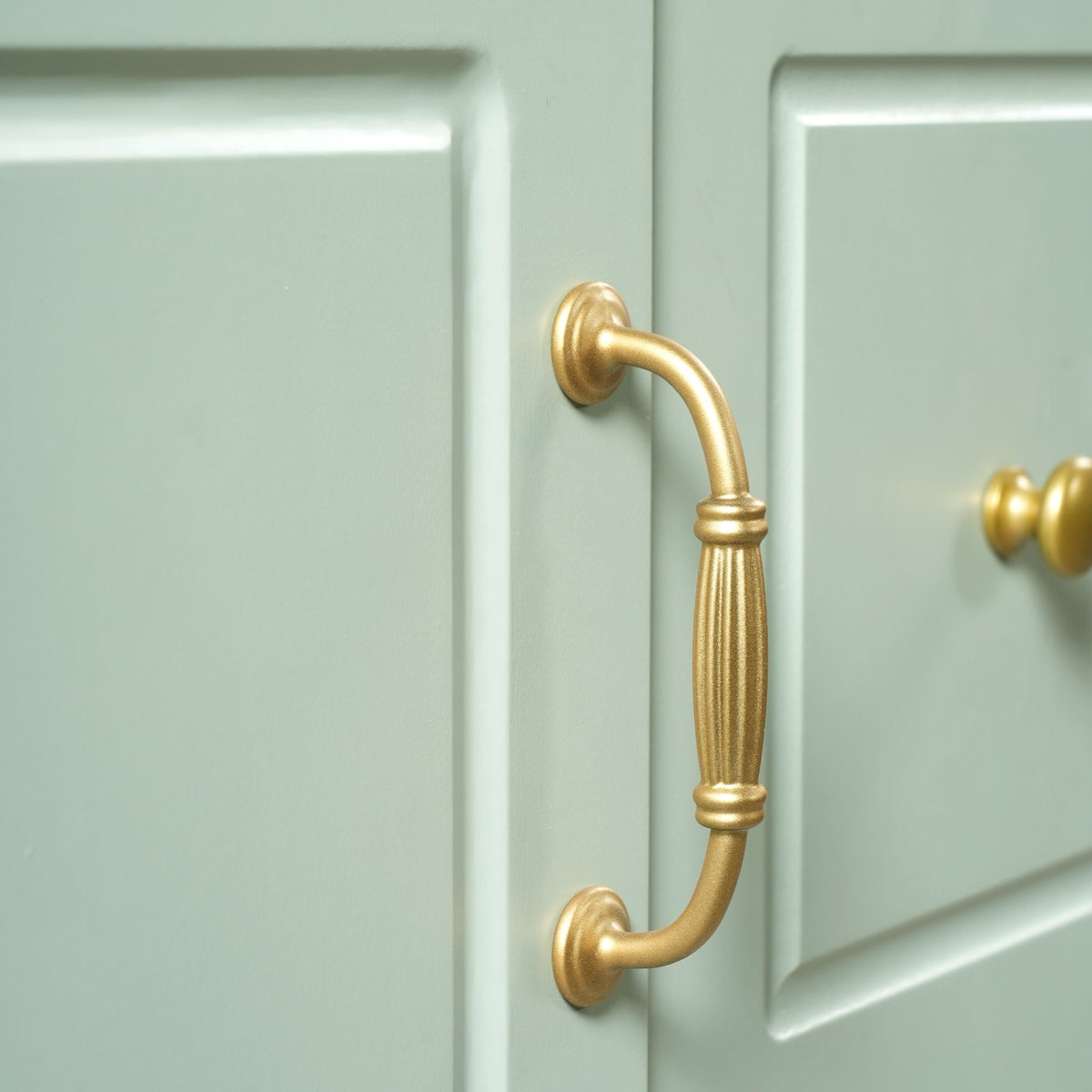 Retro vanity cabinet door with gold brass handle on mint green finish on Tampa Home & Garden Store
