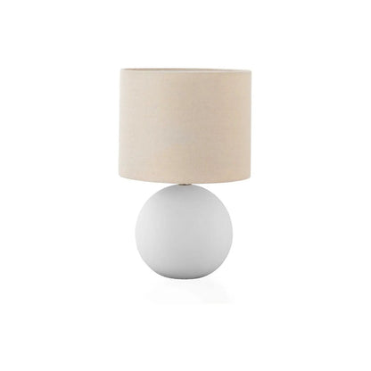 Table lamp with cream fabric shade and white spherical base in resin-ceramic style on Tampa Home & Garden Store