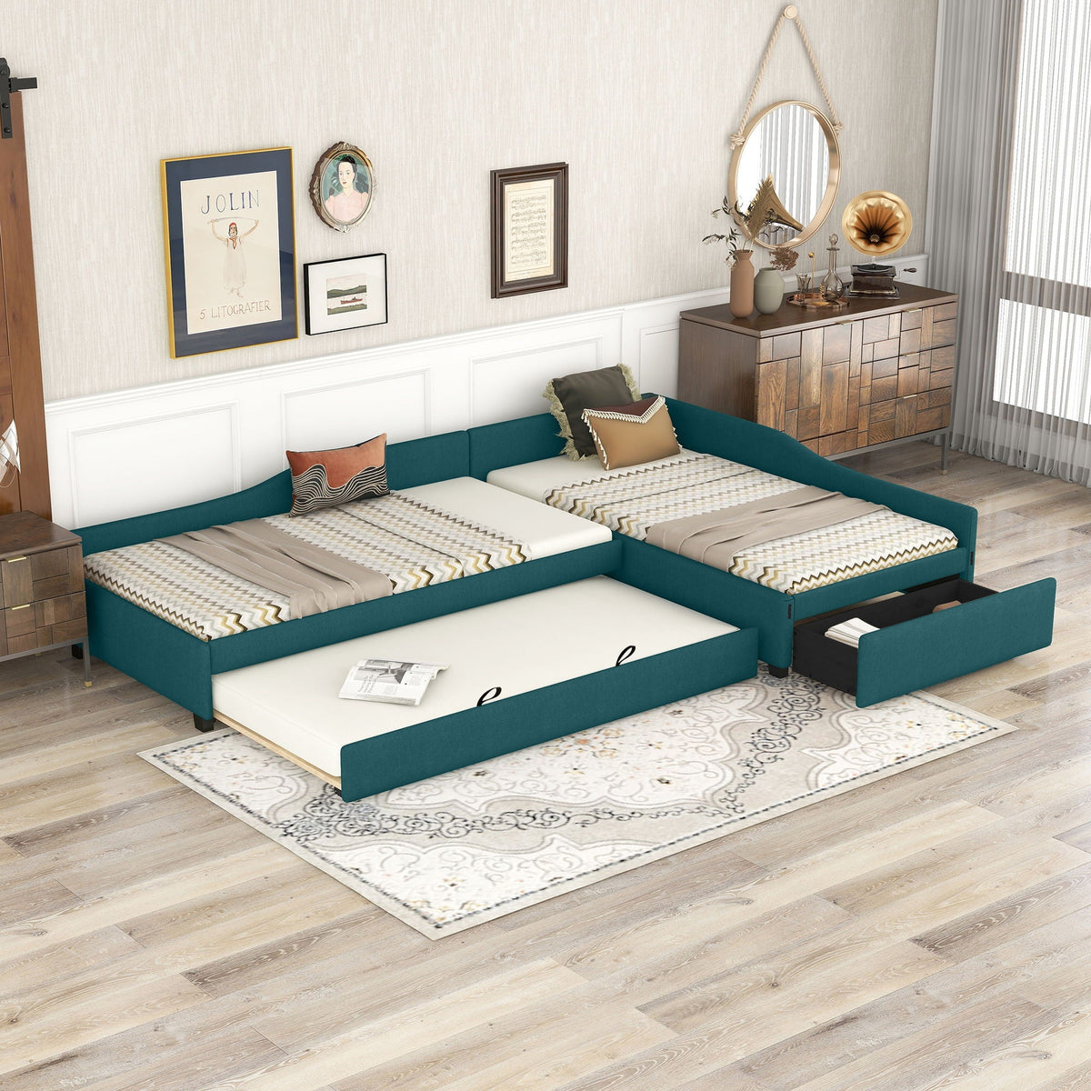 Upholstered double daybed with teal fabric and trundle and drawer in a stylish room on Tampa Home & Garden Store