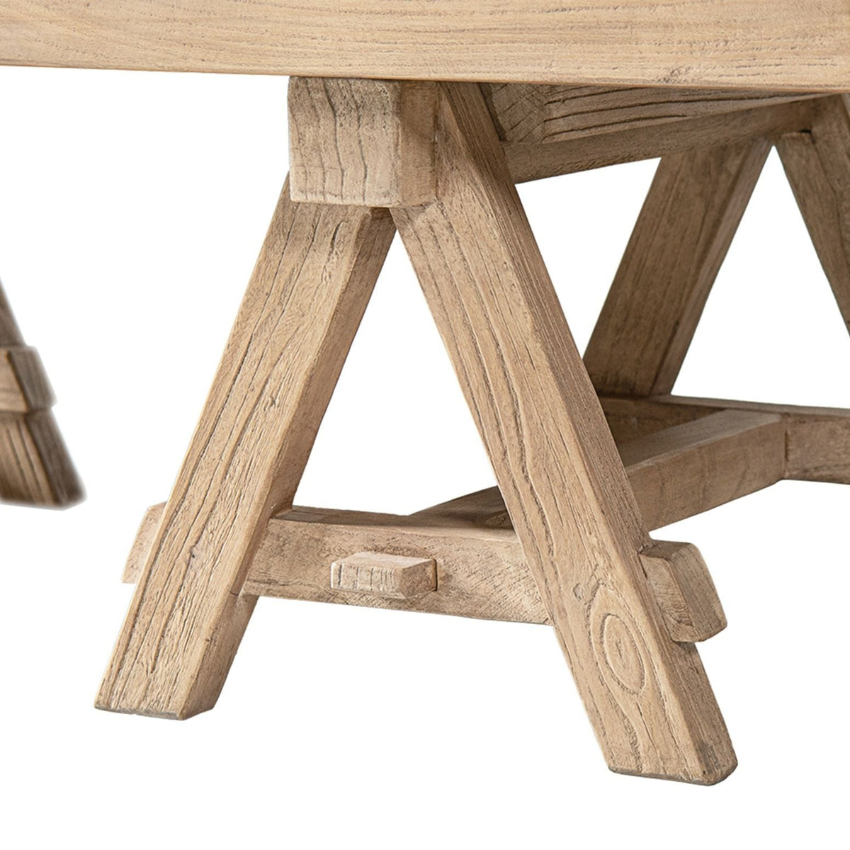 Trestle coffee table in solid reclaimed elm with light brown finish, angled legs on Tampa Home & Garden Store