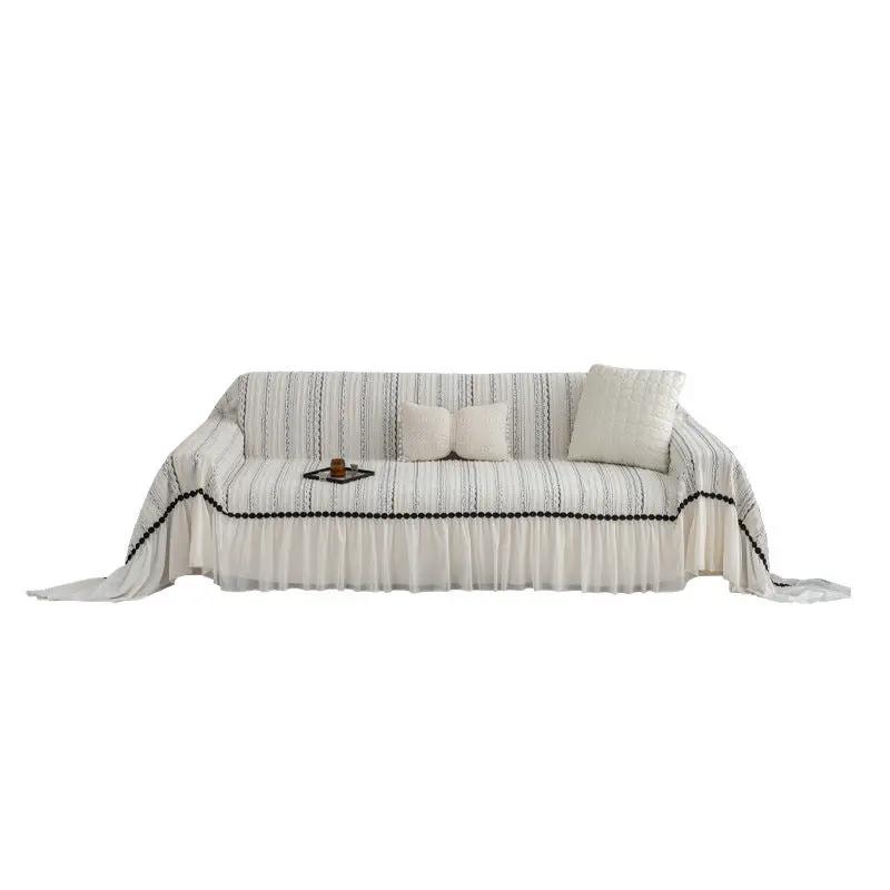 Sofa slipcover with skirted cream and blue striped fabric, black pom trim FLIPSTYLEZLLC on Tampa Home & Garden Store