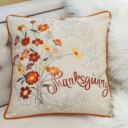 Thanksgiving Embroidered Floral Throw Pillow by HouseOfZazla with orange piping on beige linen on Tampa Home & Garden Store