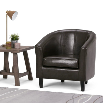 Austin Transitional Tub Chair, dark brown leather, paired with a wooden side table and brass lamp on Tampa Home & Garden Store