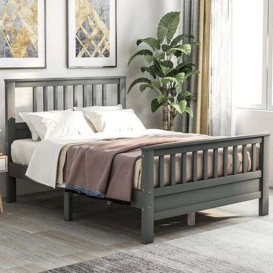 Gray wood platform bed with headboard and footboard in a bedroom with white bedding on Tampa Home & Garden Store
