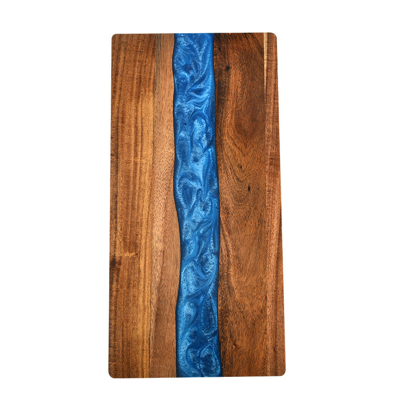 Acacia wood charcuterie board with blue epoxy ocean-wave resin inlay on Tampa Home & Garden Store