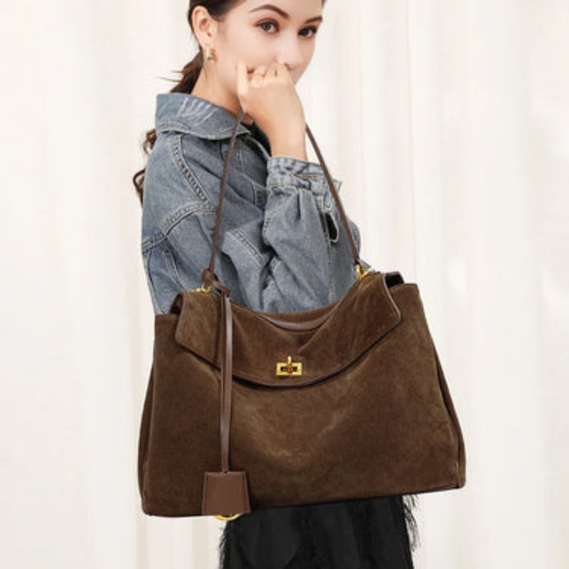 Moktan Sabai large rectangular suede shoulder handbag in brown with gold-tone turnlock hardware on Tampa Home & Garden Store