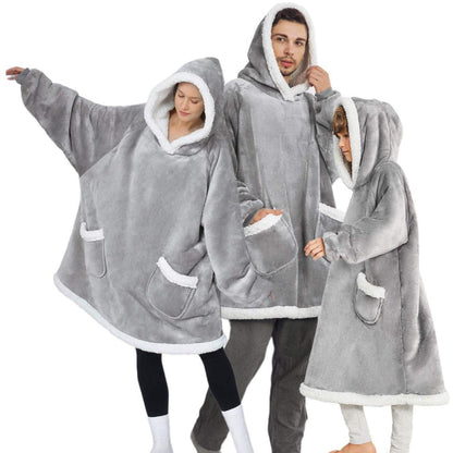 Three Stevvex oversized hoodie blanket in gray fleece with sleeves, hood, white trim and pockets on Tampa Home & Garden Store
