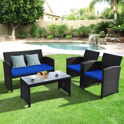 Juego de Muebles de Patio de Ratán de 4 Piezas con Cojines Resistentes al Clima y Mesa con Cubierta de Vidrio Templado-Azul Marino