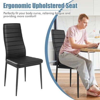 Two black leather dining chairs with metal frames on Tampa Home & Garden Store