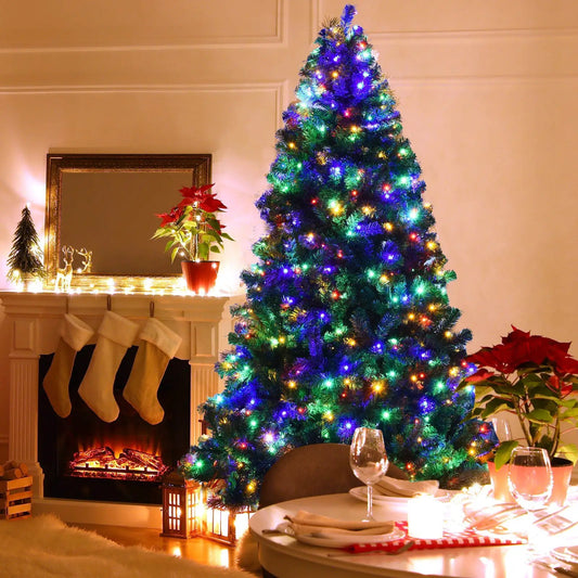7.5 ft pre-lit artificial spruce Christmas tree with 550 multicolor lights in a cozy living room DirectDeals on Tampa Home & Garden Store