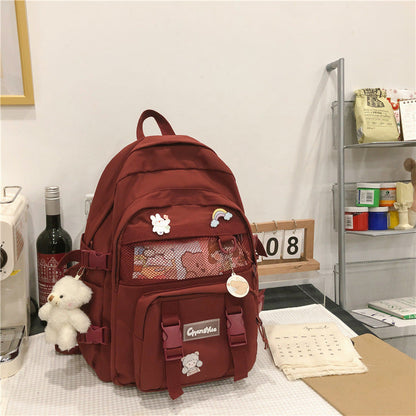 Stevvex red teen school backpack with cute patches and plush keychain on Tampa Home & Garden Store