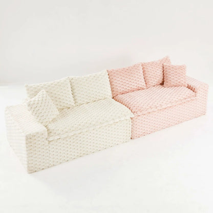 Stationary sofa with ivory and blush pink chunky knit throws Unique Piece Furniture on Tampa Home & Garden Store