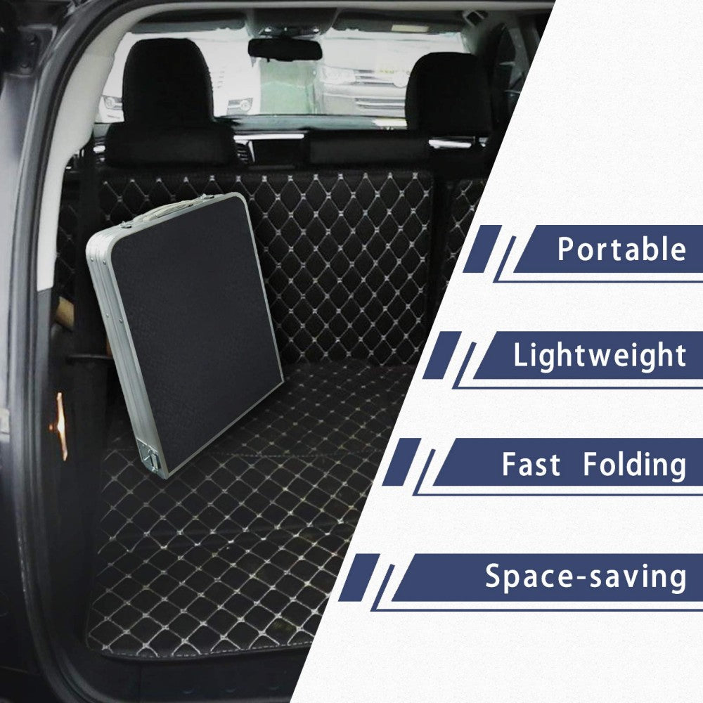 Folding camping table and storage compartment