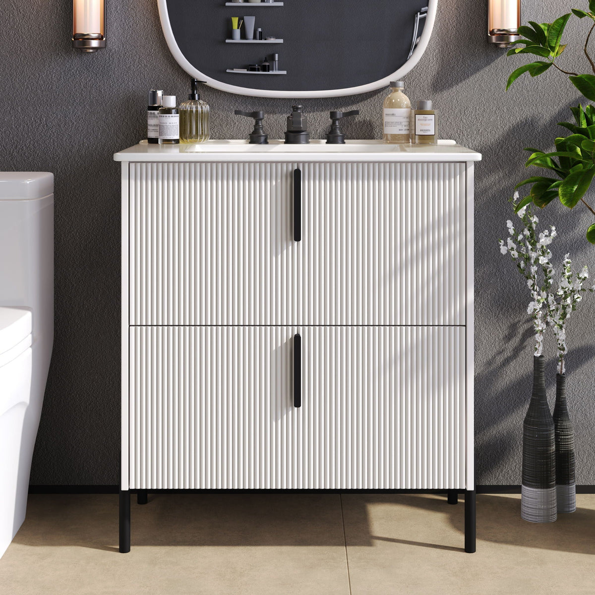 Bathroom vanity with ceramic sink and white fluted cabinet doors on black legs on Tampa Home & Garden Store
