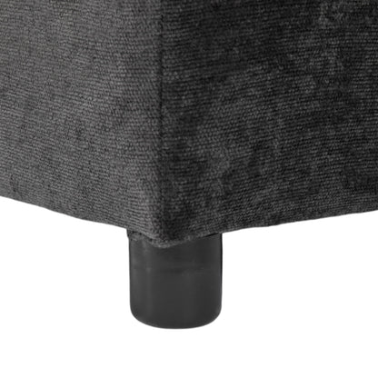 Sectional sofa leg close-up in charcoal gray fabric with a black metal leg base on Tampa Home & Garden Store