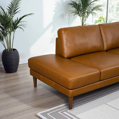 Corbin L-shaped stationary sectional sofa in caramel leather with tapered wood legs on Tampa Home & Garden Store