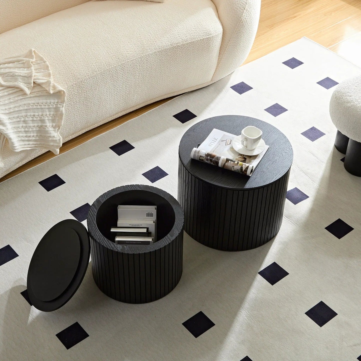 Two black round nesting tables with grooved sides, 2-piece set on Tampa Home & Garden Store