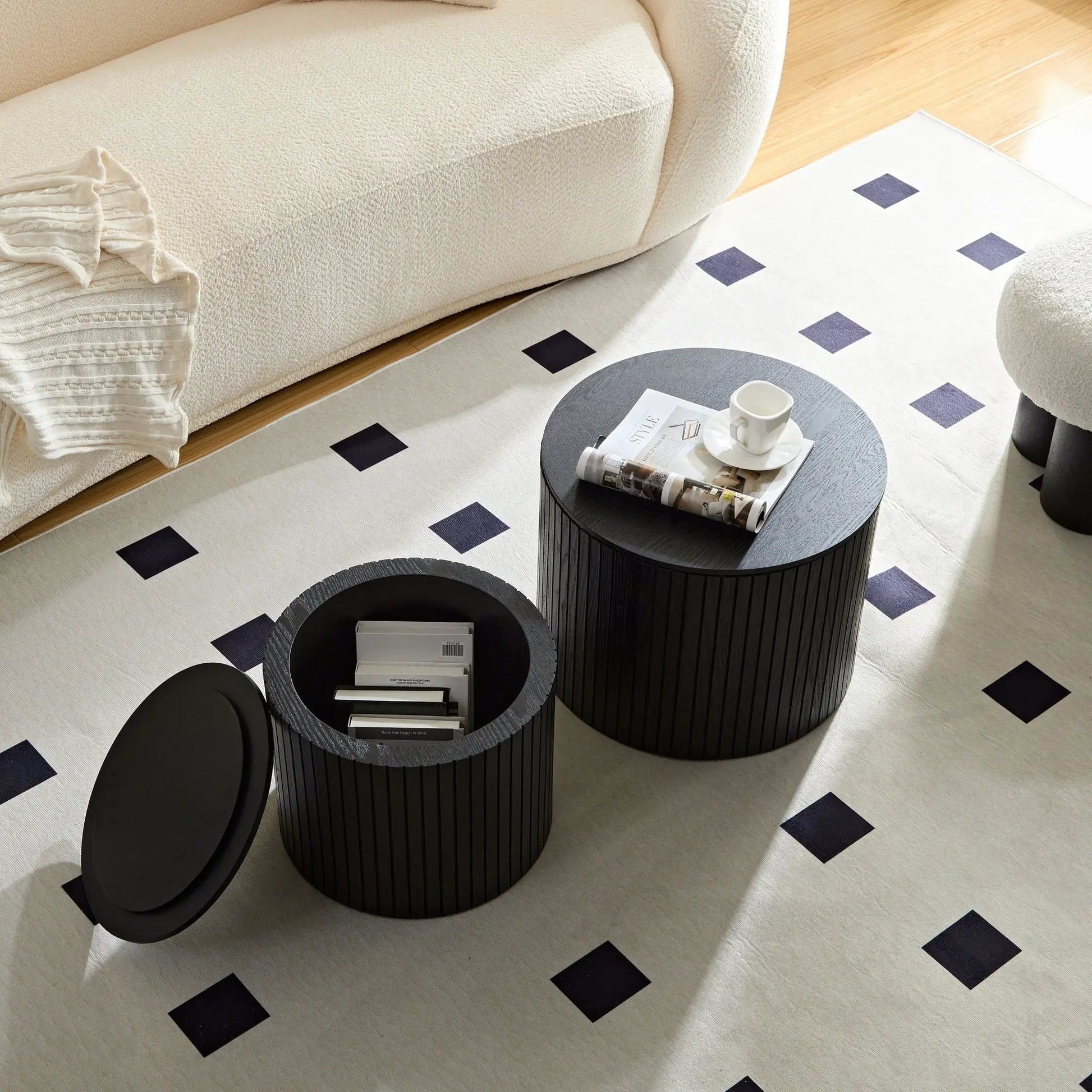 Two black round nesting tables with grooved sides, 2-piece set on Tampa Home & Garden Store
