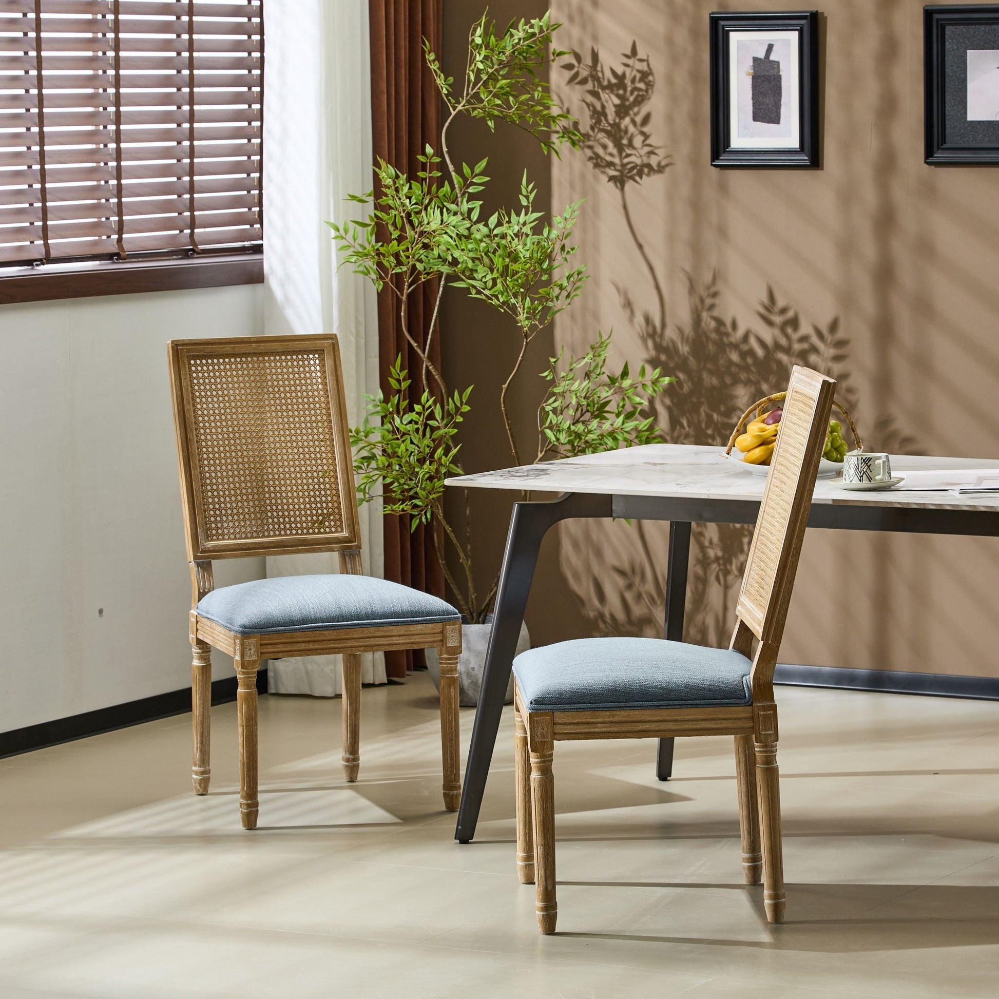 French Country dining chair with rectangular cane back and light blue upholstered seating on Tampa Home & Garden Store