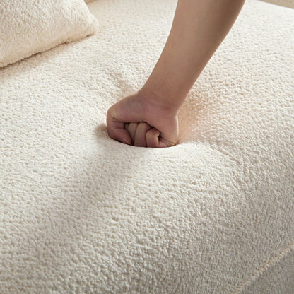 Foot pressing into soft cream plush carpet closeup showing thick fiber texture on Tampa Home & Garden Store
