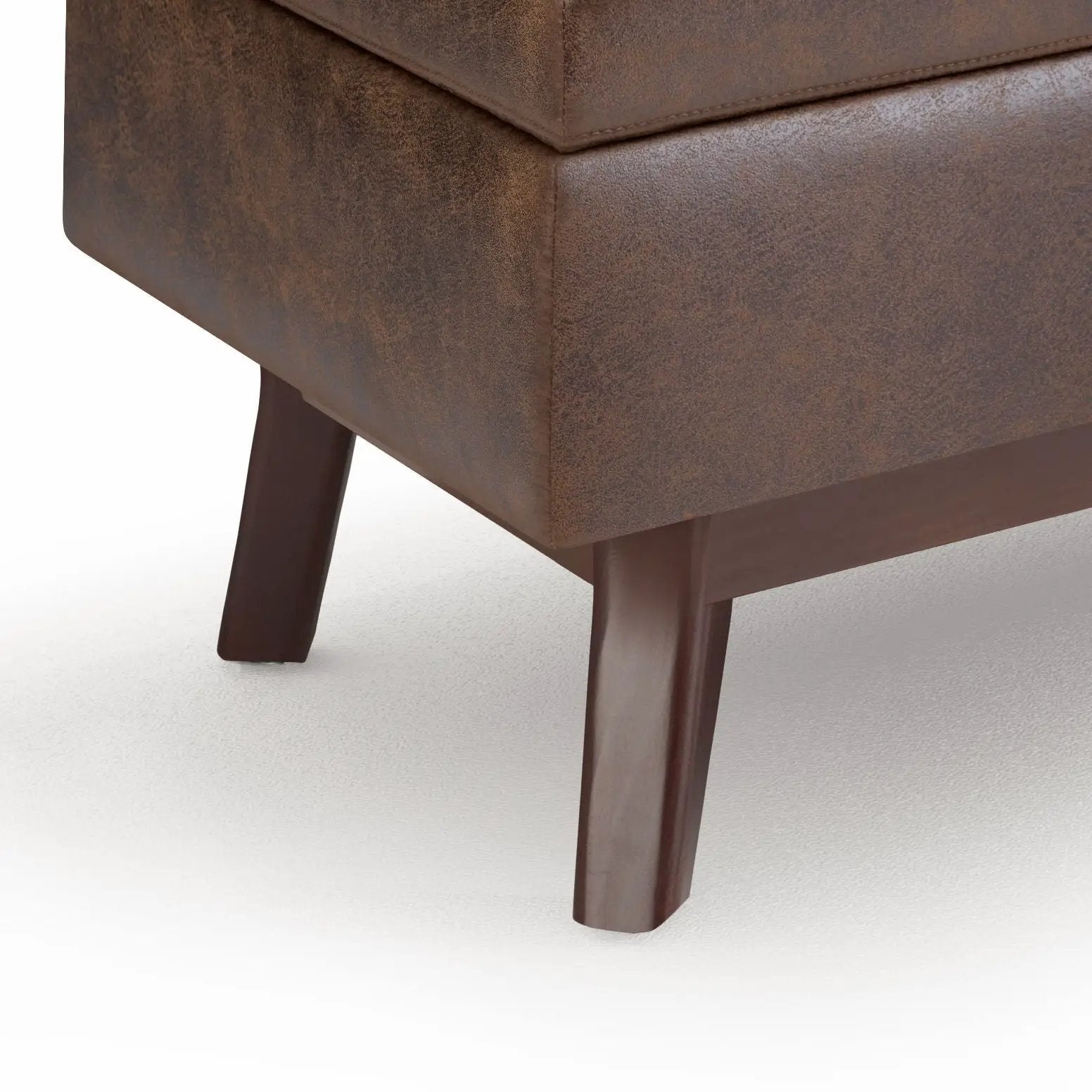 Owen Upholstered Rectangular Storage Ottoman in brown faux leather with dark wood legs on Tampa Home & Garden Store