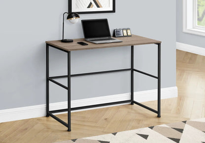 Computer desk with wood top and black metal frame, laptop and lamp on Tampa Home & Garden Store