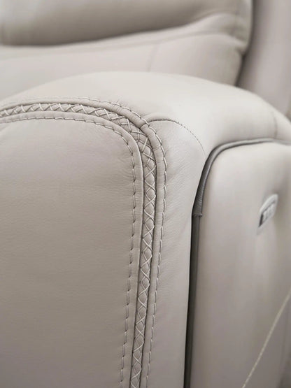 Gravier Reclining Sectional beige leather with braided arm stitching on Tampa Home & Garden Store