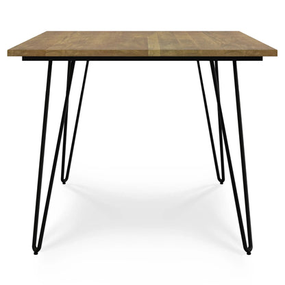 Hunter Handcrafted Dining Table with warm wood finish and black metal hairpin legs on Tampa Home & Garden Store