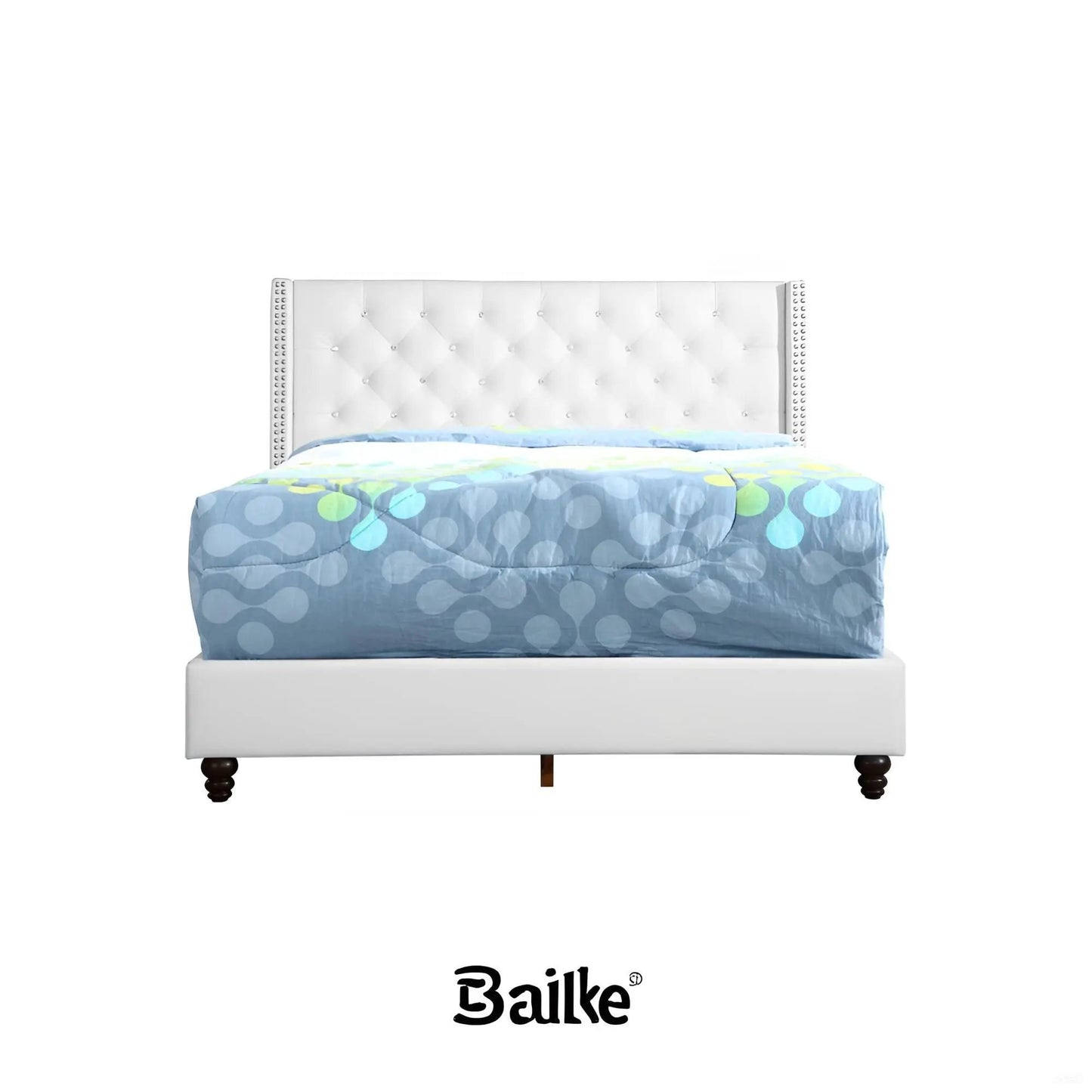 Upholstered nailhead trim chic bed in white with tufted headboard and dark wood legs on Tampa Home & Garden Store