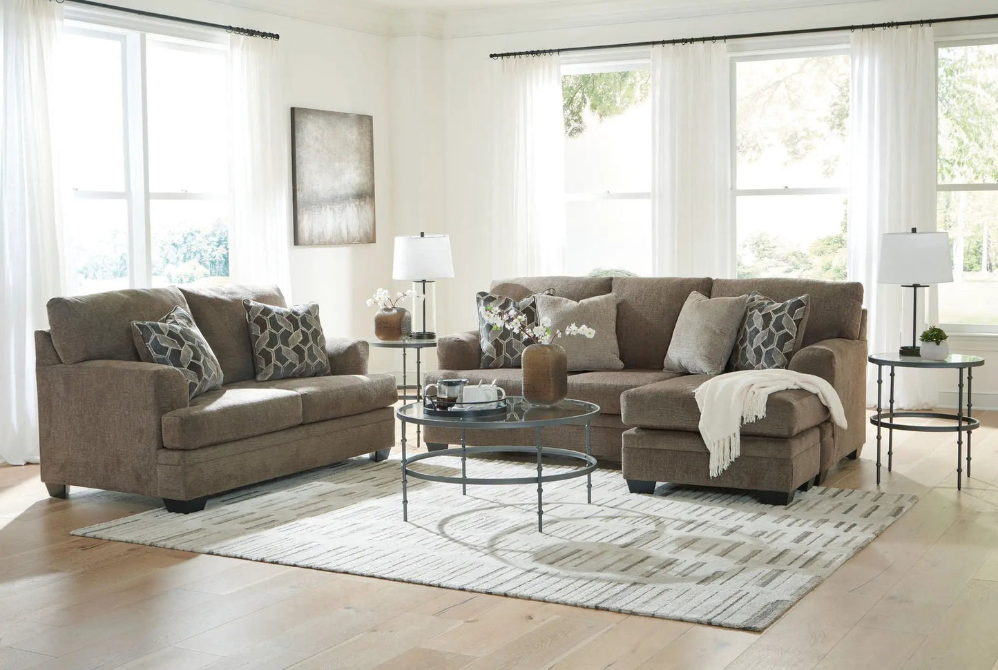 Stonemeade 3-Piece Living Room Set in taupe-brown fabric with sofas and glass coffee table on Tampa Home & Garden Store