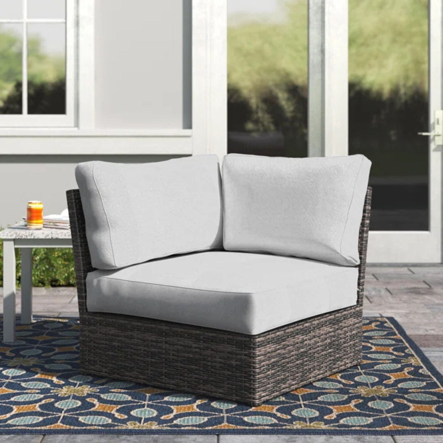 Shick Corner Wedge Patio Chair with Cushions in dark wicker and light gray cushions on Tampa Home & Garden Store