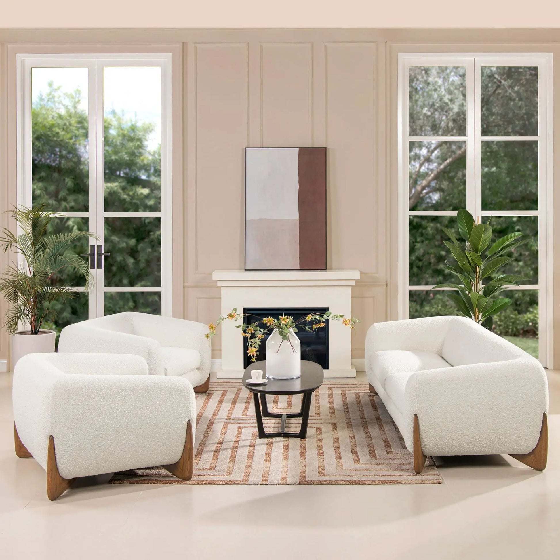 Set of four Alpine Sherpa Arm Chairs in white fabric with wooden legs around a coffee table on Tampa Home & Garden Store
