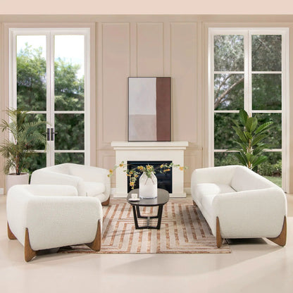 Set of four Alpine Sherpa Arm Chairs in white fabric with wooden legs around a coffee table on Tampa Home & Garden Store