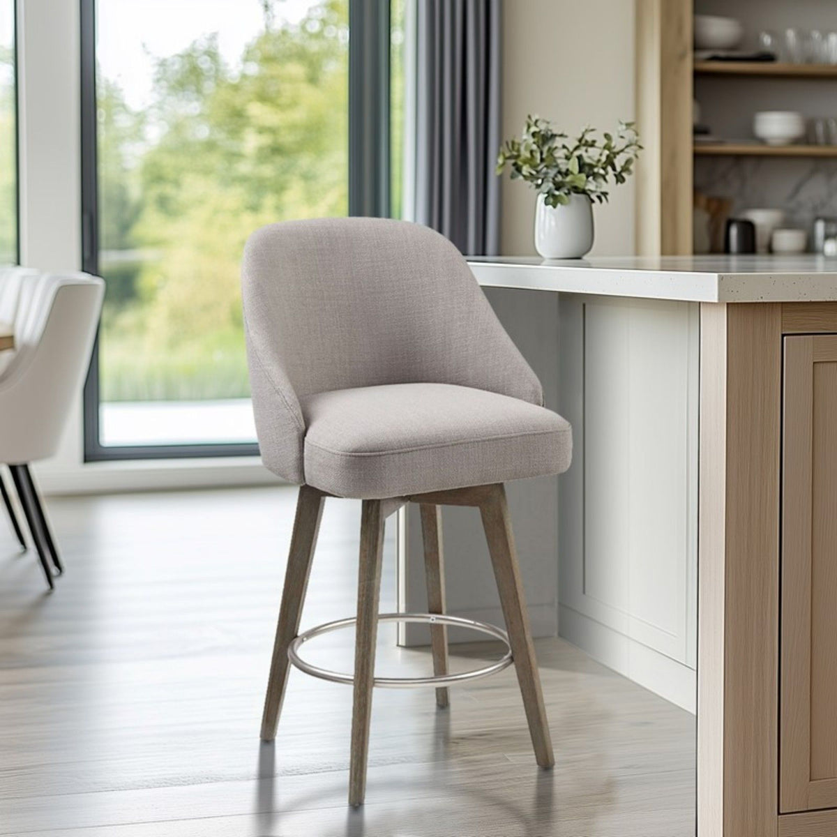 Beige upholstered counter stool with swivel seat and solid wood legs at kitchen island on Tampa Home & Garden Store