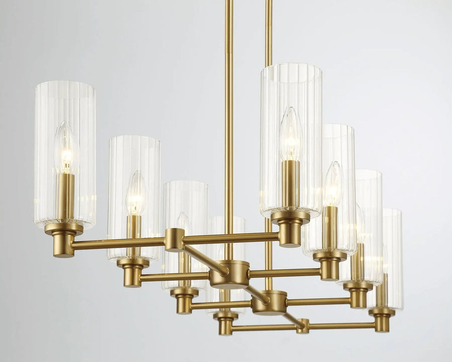 Willow 8-light pendant chandelier in antique brass with clear ribbed glass shades on Tampa Home & Garden Store
