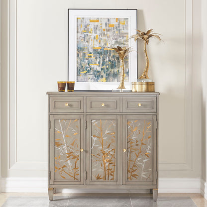 Dauphin gray cashmere entryway cabinet with three top drawers and gold botanical panel doors on Tampa Home & Garden Store