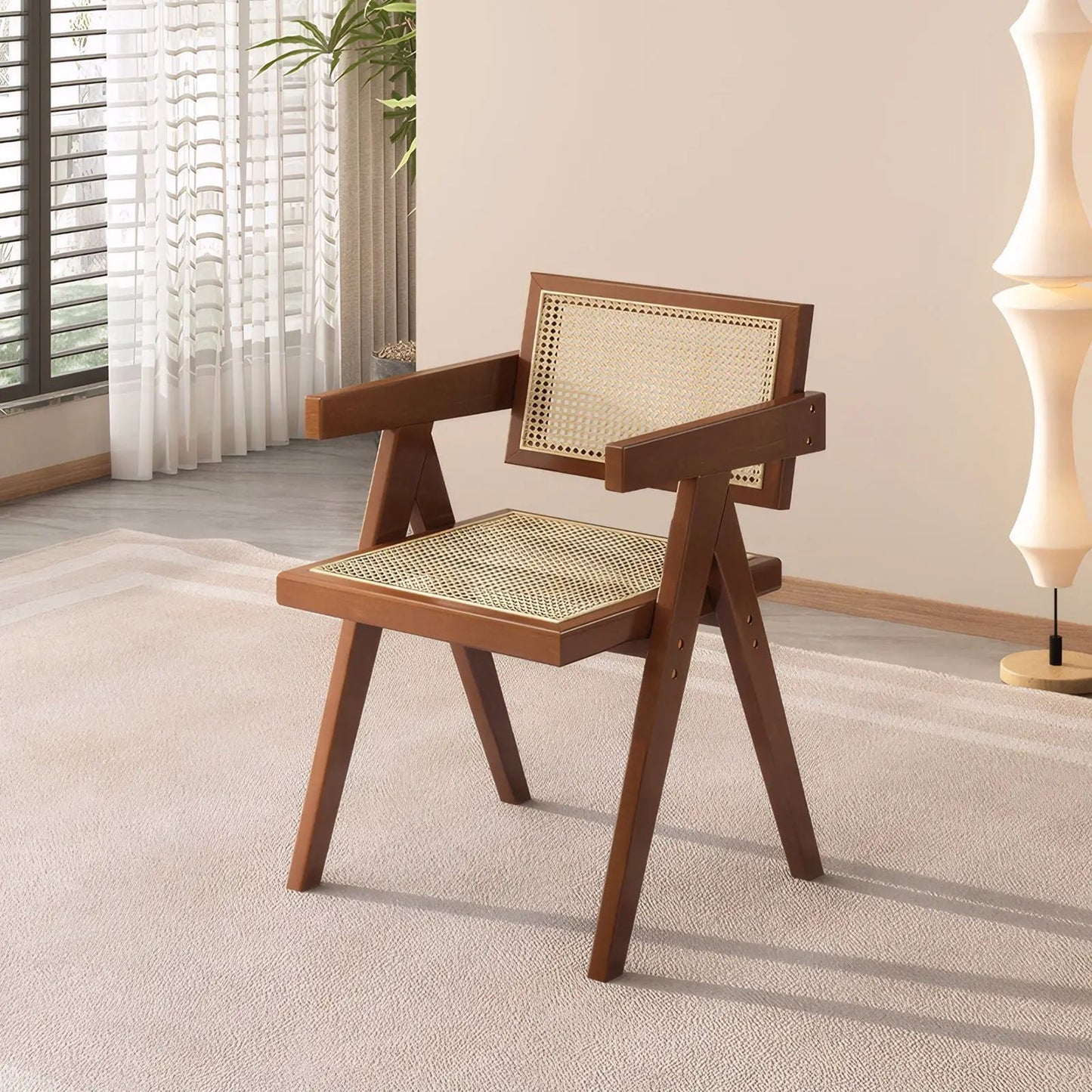 Modern mid-century dining chair with walnut wood frame and woven cane back and seat on Tampa Home & Garden Store