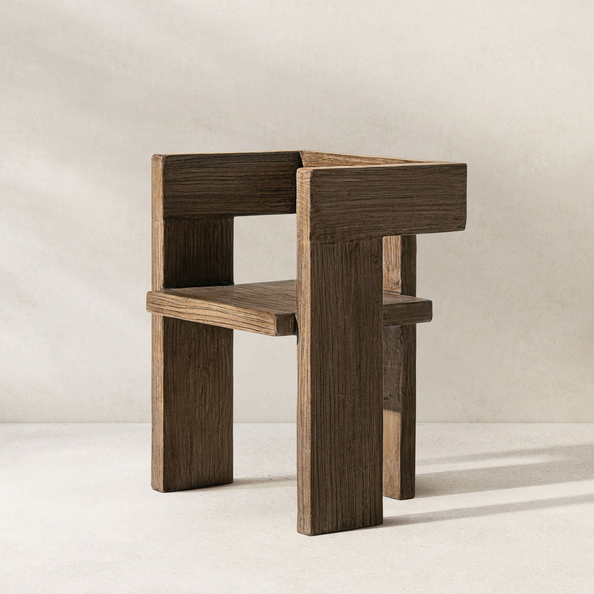 Sculptural Block Arm Chair in brown reclaimed elm with chunky rectangular legs on Tampa Home & Garden Store