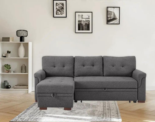 Sierra reversible sleeper sectional with storage chaise in dark gray fabric tufted cushions on Tampa Home & Garden Store