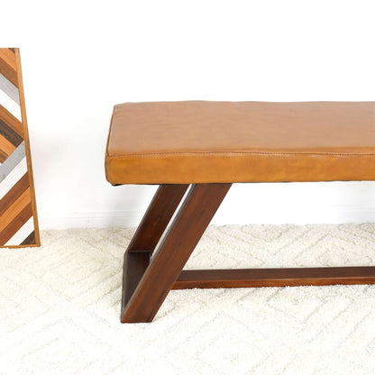 Light brown upholstered bench by HouseOfZazla with hand-stitched leather top and angled wooden legs on Tampa Home & Garden Store