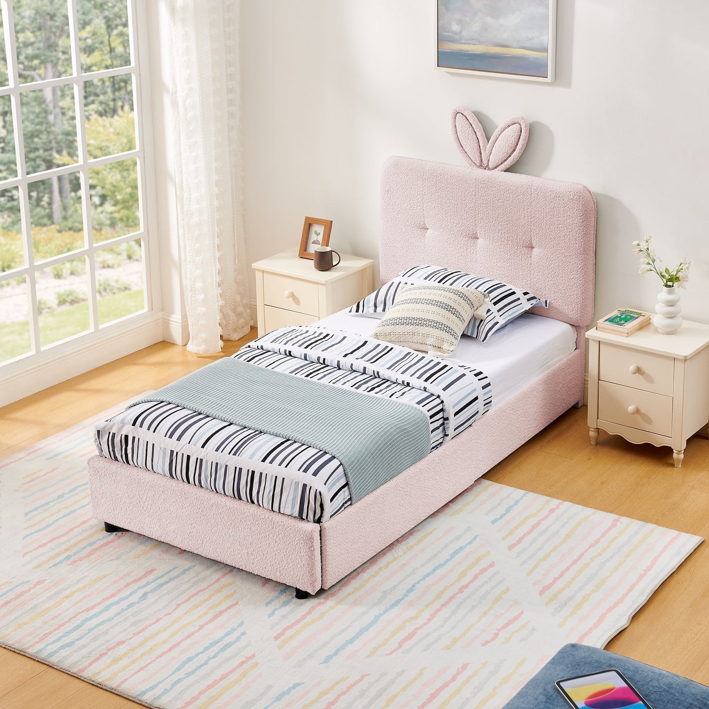 Twin size kids upholstered bed with oversized rabbit-ear headboard in soft pink boucle on Tampa Home & Garden Store