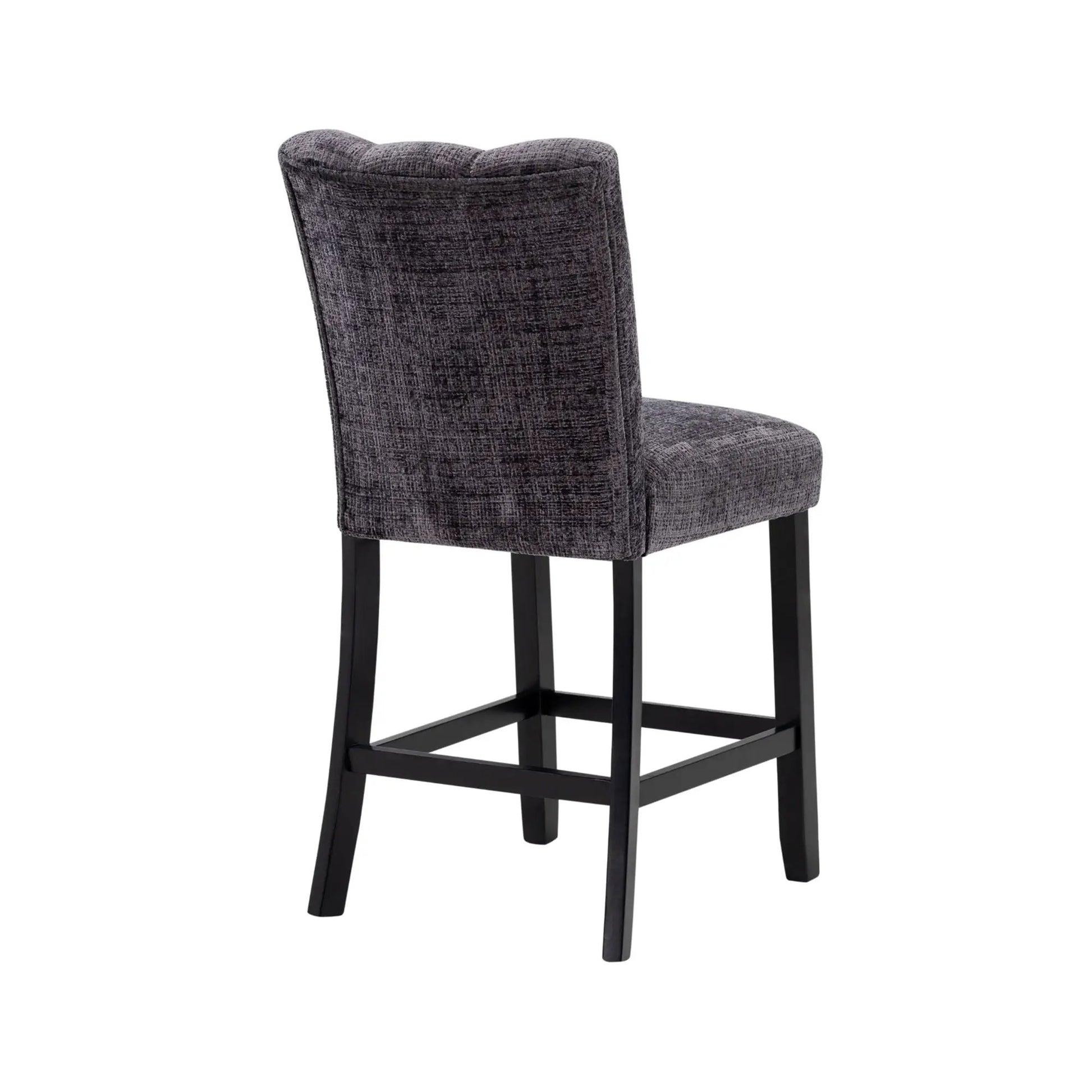 Magaly bar stool in dark gray fabric with padded back and black metal legs on Tampa Home & Garden Store