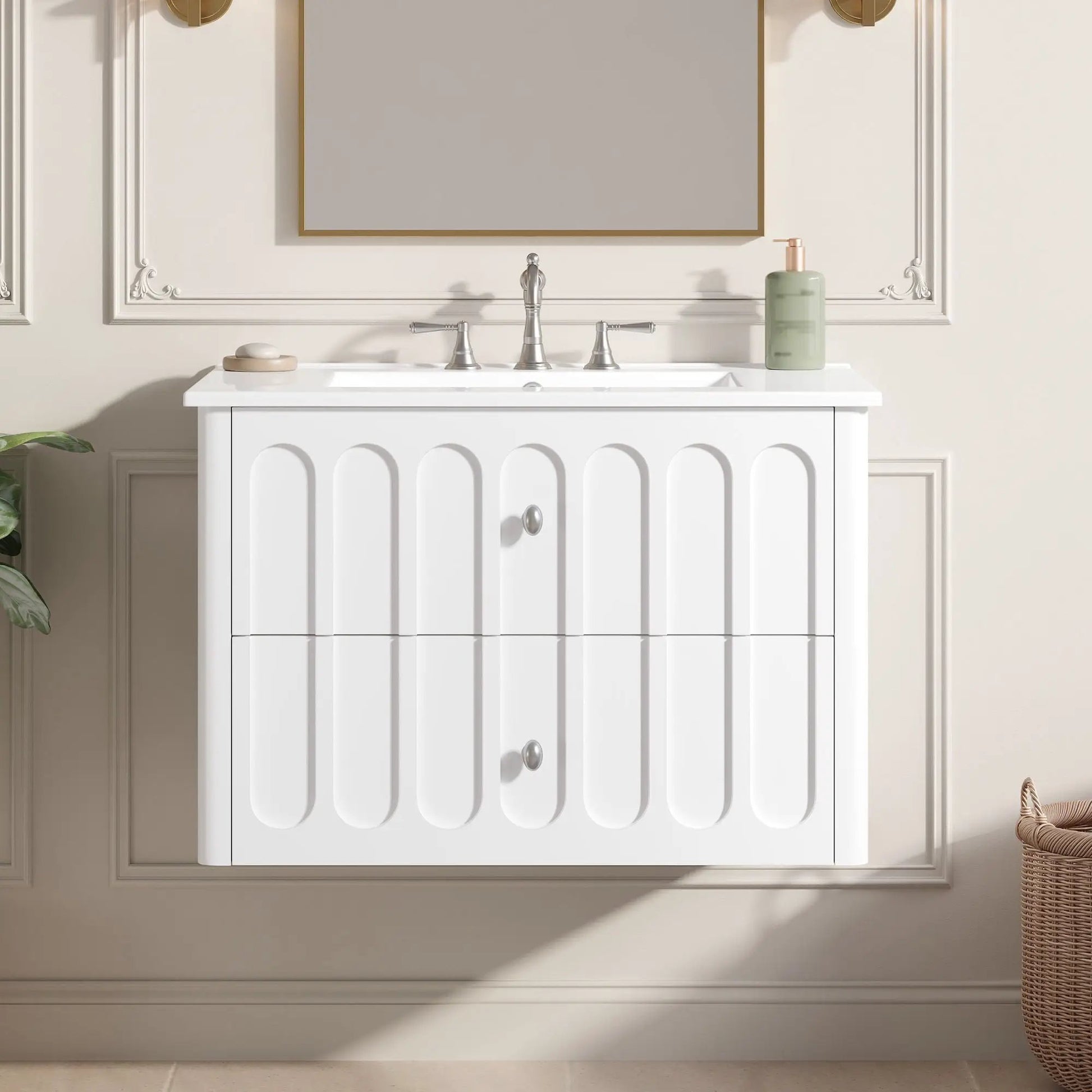 Floating white bathroom vanity with rounded-edge drawers, oval knobs, and silver faucet on Tampa Home & Garden Store