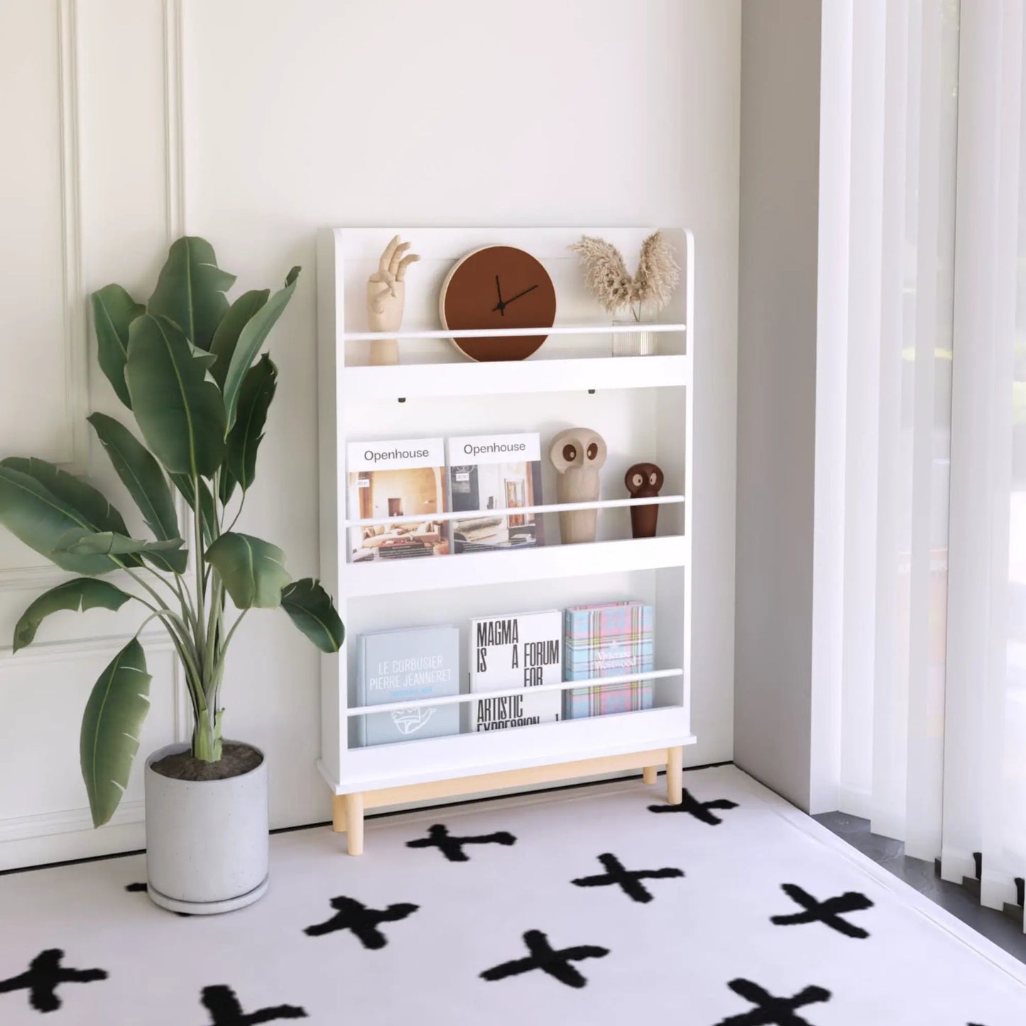 Wall Mounted Bookshelf white with 3 front-facing display shelves and a brown clock on Tampa Home & Garden Store