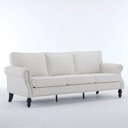 Rolled Arm Sofa with Nailhead Trim and Wooden Legs in beige upholstery on Tampa Home & Garden Store