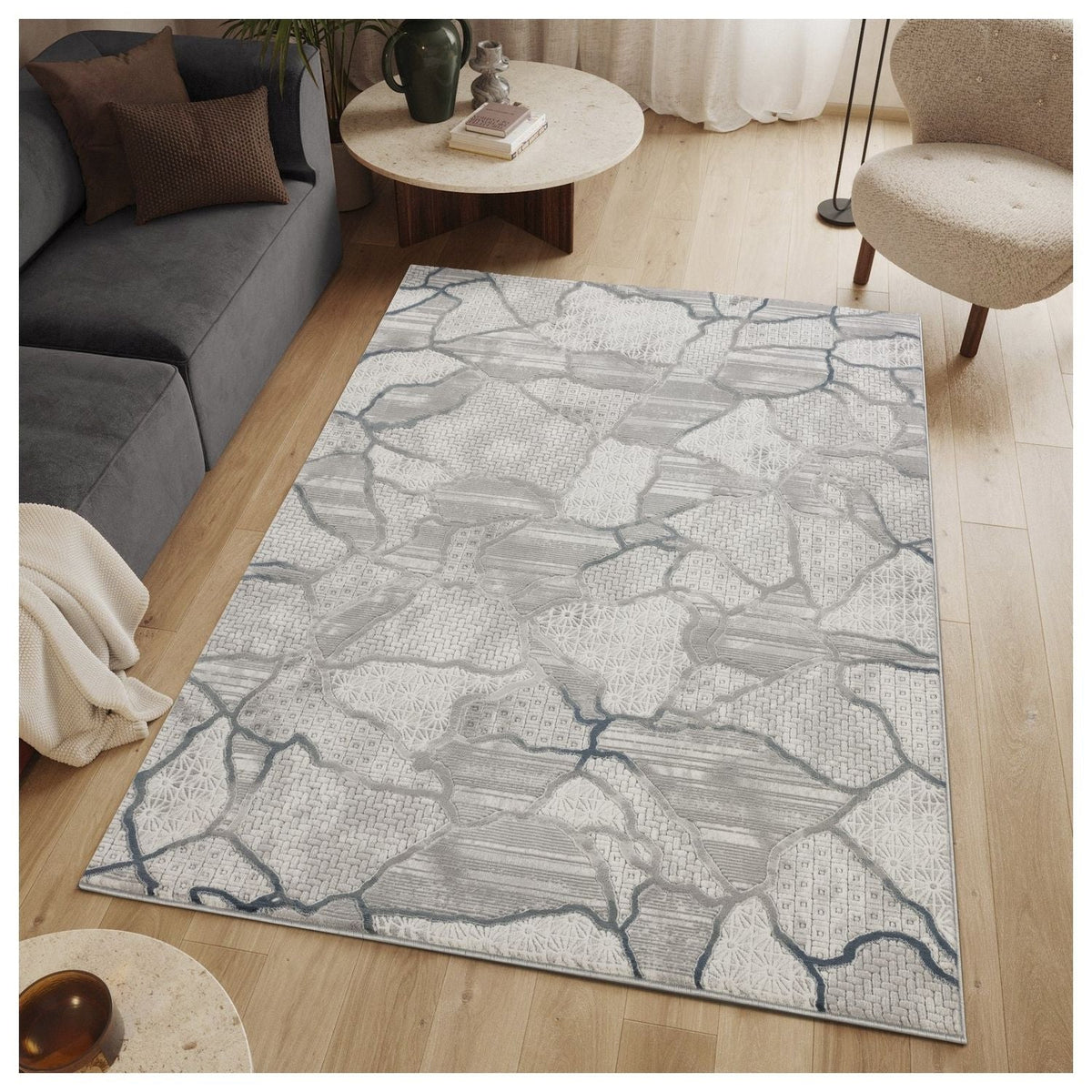 Modern Geometric Area Rug gray and ivory by HouseOfZazla in a living room setting on Tampa Home & Garden Store