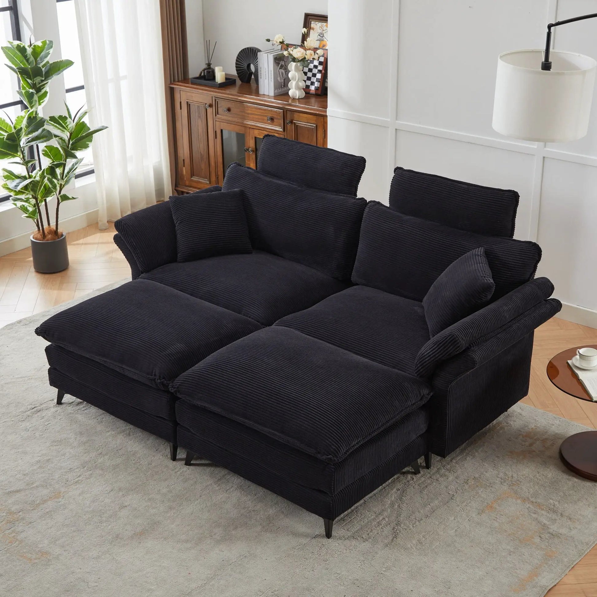 Modern deep-seat sectional sofa with ottoman in black corduroy fabric on Tampa Home & Garden Store