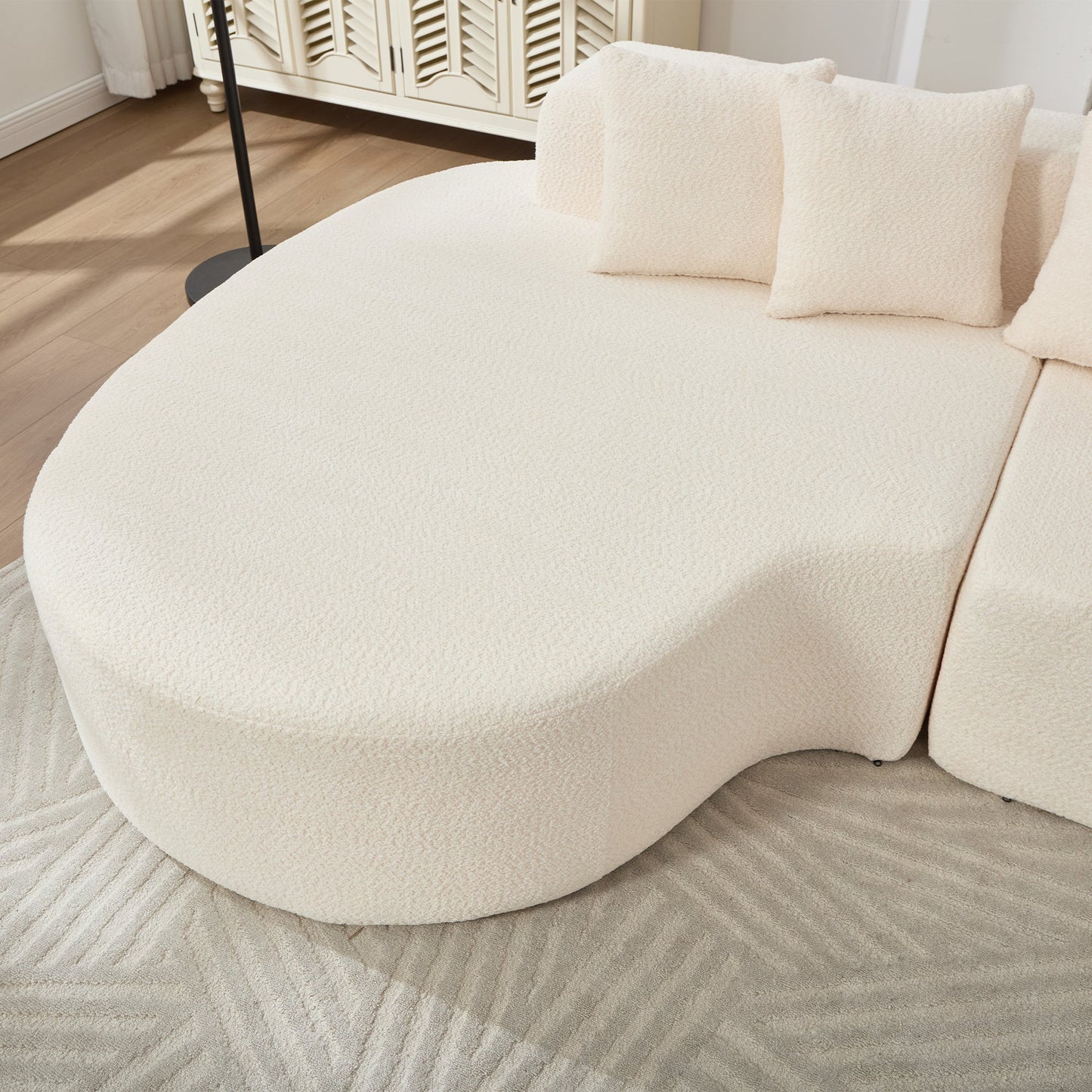 Curved Sectional Sofa and Ivory Chenille Pillows