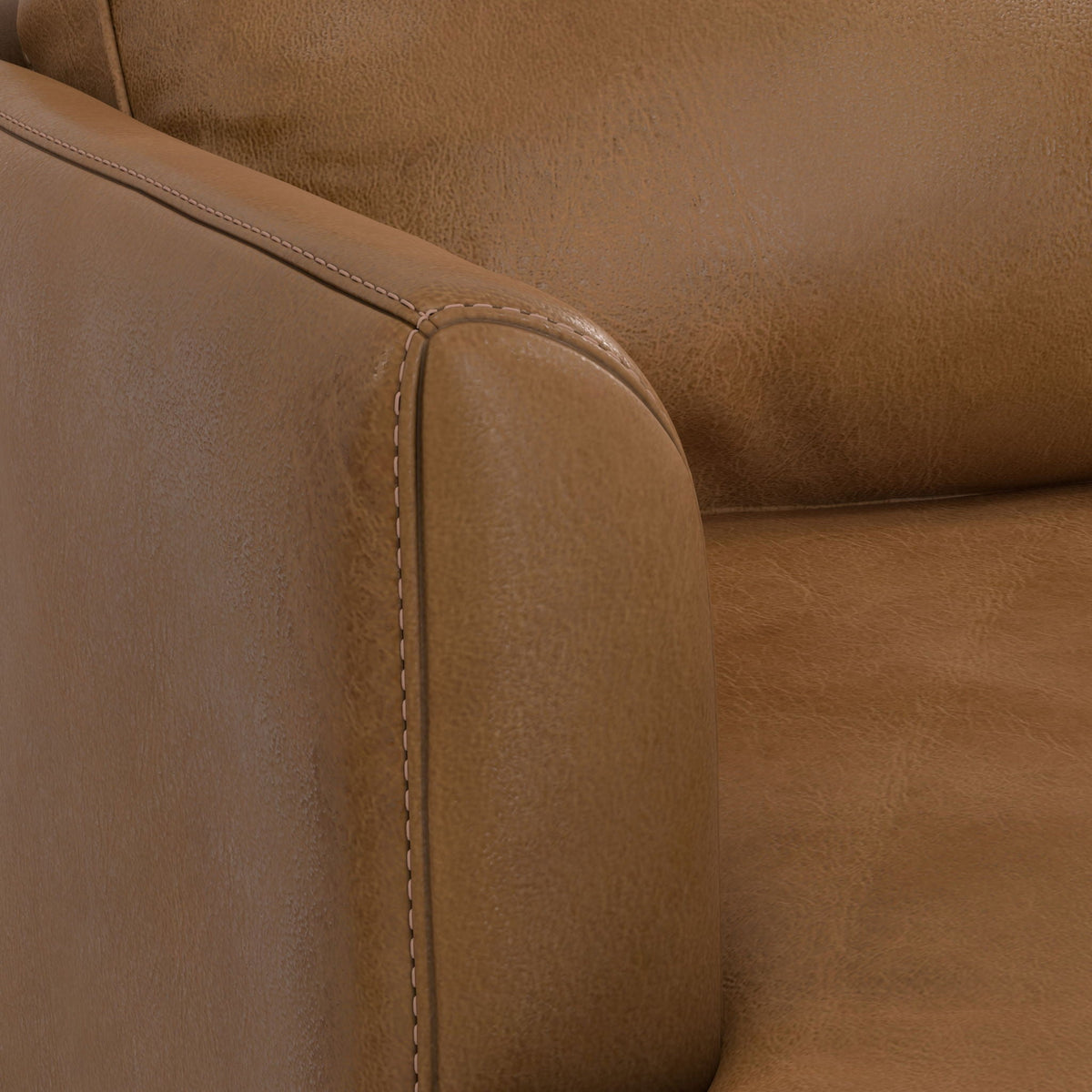 Livingston upholstered sofa armrest close-up in tan leather with stitch detail by HouseOfZazla on Tampa Home & Garden Store